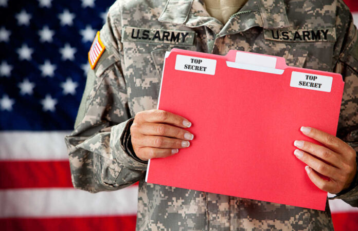 Soldier:,Woman,Holding,Top,Secret,Documents