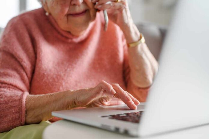 Online,And,Phone,Scams,Targeting,Seniors.,Scammer,Sending,Email,To