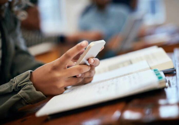 Hands,,School,And,University,With,Phone,For,Research,,Reading,Message