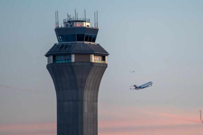 Airport,Control,Tower,During,Takeoff,Airplane