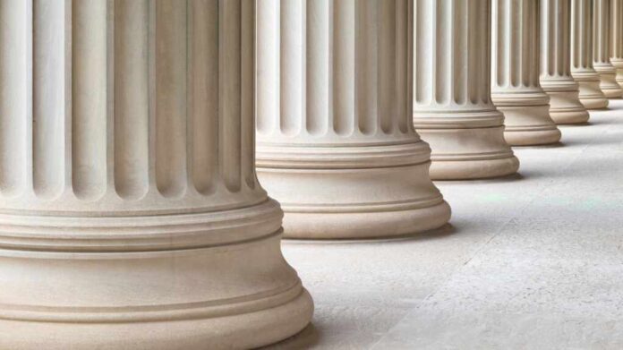 Architectural,Detail,Of,Some,Neoclassical,Columns,Symbolizing,Justice,And,The
