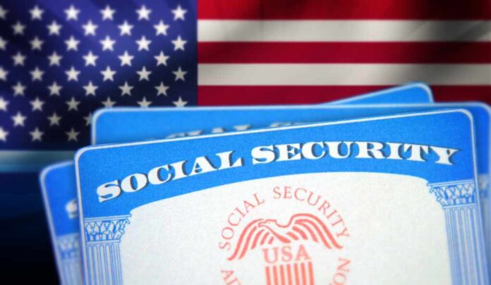 Social,Security,Card,With,Blur,American,Flag,Waving,In,The