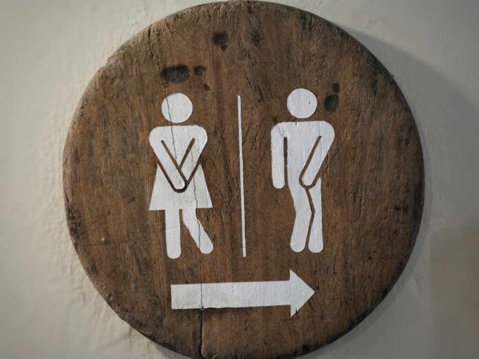 Symbol,Toilets,On,The,Wooden,Floor,bathroom,,Men,,Women.