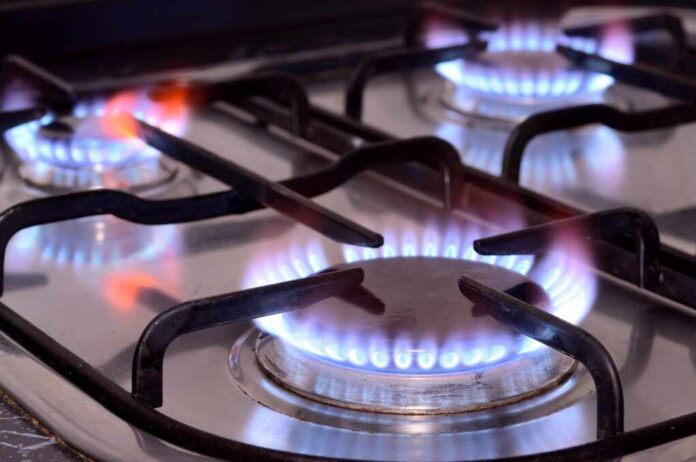 Closeup,Shot,Of,Fire,From,Gas,Kitchen,Stove.,Closeup,Of