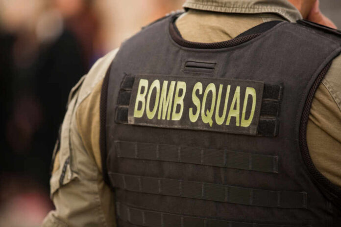 A,Police,Officer,Watches,Over,A,Scene.