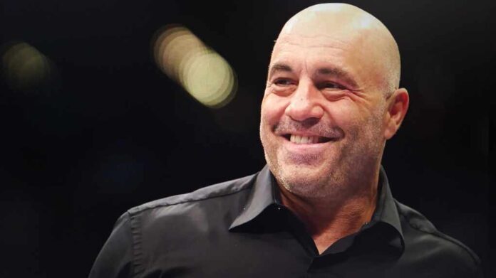 Joe,Rogan,Smiles,In,A,Closeup,Shot,Against,A,Blurred