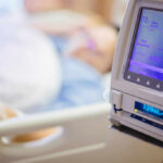 MenB Vaccine Gaps EXPOSED: Teens at Risk IV pump displaying medication flow rate in a hospital room