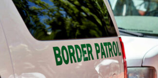 Close-up of a border patrol vehicle with green lettering