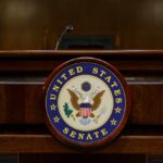 Trump-Backed Election Bill Faces Senate Roadblocks Podium with the United States Senate seal in a formal setting