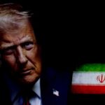 Close-up portrait of a political figure with an Iranian flag in the background