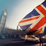 Crippling Pothole Bill: Hidden Costs EXPOSED British flag waving in front of Big Ben in London