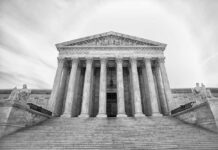 Supreme Court Overruled? Colorado’s Controversial Bill Front view of the Supreme Court building with columns and statues