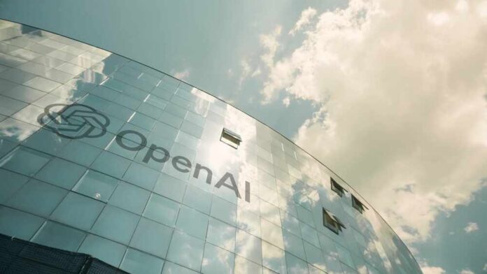 A modern glass building with the OpenAI logo against a cloudy sky