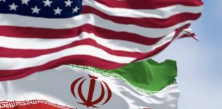 Flags of the United States and Iran waving together