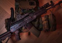 Innocents Caught in Gang Crossfire Horror A tactical firearm placed on a military vest with accessories