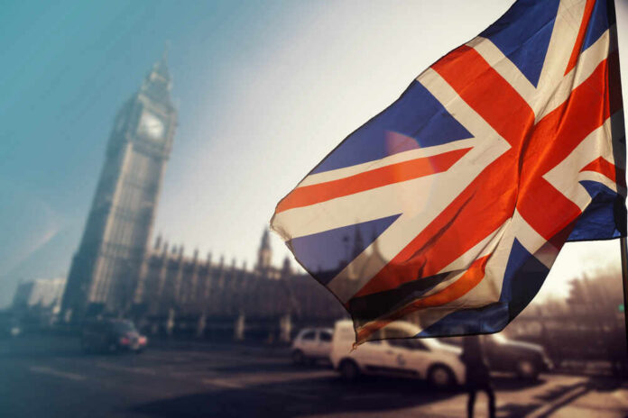 British flag waving in front of Big Ben in London