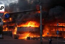 Fires burn in Kyiv after Russia uses hypersonic missile in mass attack on Ukraine