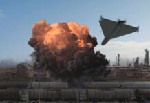 A drone flying above an explosion at an industrial facility