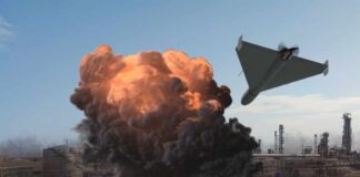 A drone flying above an explosion at an industrial facility