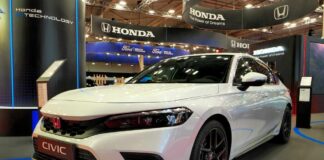 White Honda Civic displayed at a car exhibition