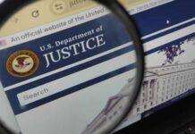 DOJ Election Bombshell: ‘TON OF EVIDENCE’ Unveiled Close-up view of the U.S. Department of Justice website through a magnifying glass