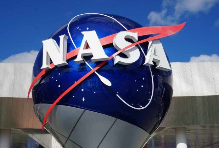 Cape,Canaveral,,Florida,-,December,27,,2021:,Close,Up,Of NASA logo displayed on a large blue globe against a clear sky