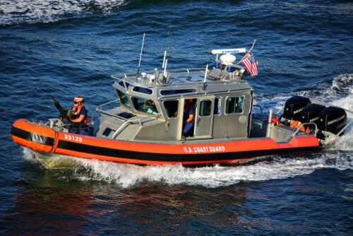 U.S. Coast Guard boat navigating through water