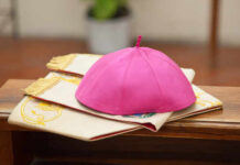 Bishop Gunned Down — Authorities Go Quiet A pink ceremonial cap placed on a decorative cloth