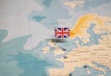 UK Ban Demands IDs — Privacy On The Line A map of Europe with a small flag of the United Kingdom pinned on it