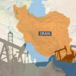 Map of Iran highlighting oil production areas with oil rigs in the foreground