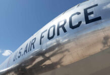 Qatar Jet Sparks Air Force One Uproar Close-up of a U.S. Air Force aircraft with a shiny metallic surface against a blue sky
