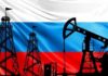 Ukraine’s Lockdown Strangles Putin’s Supply Chain Oil pumpjack and drilling rigs silhouetted against the Russian flag