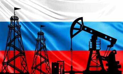 Oil pumpjack and drilling rigs silhouetted against the Russian flag