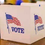 New Jersey Bombshell: Non-Citizens Registered voting booth with American flag graphics