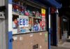 Audit Panic After Shocking Welfare Stats Convenience store window with EBT and ATM signs