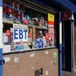 Audit Panic After Shocking Welfare Stats Convenience store window with EBT and ATM signs