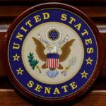 United States Senate seal on a wooden wall