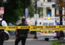 Elite Hit-And-Run Sparks Outrage Police officers near a crime scene marked by caution tape