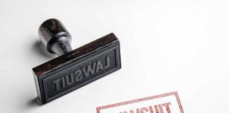 Rubber stamp with red lawsuit imprint on white paper
