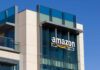 amazon logo on modern glass office building