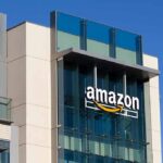 amazon logo on modern glass office building