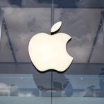 Apple logo on glass storefront