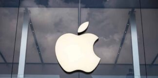 Apple logo on glass storefront
