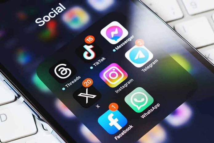 Smartphone showing social media app icons in a folder.