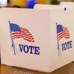 voting booth with American flag graphics