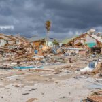 storm-damaged coastal neighborhood with demolished houses