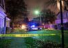 Midnight Home Invasion Shocks Pittsburgh Police car blocks residential street at night behind caution tape