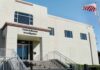 FBI office building with entrance steps and American flag