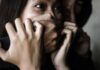 Kidnapped Student Outsmarts Attacker With One Tap woman with hands covering her mouth in fear