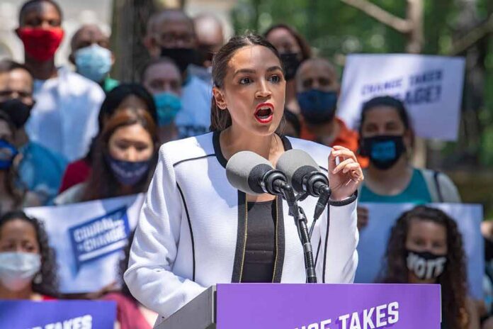 Woman speaking at outdoor podium with microphones
